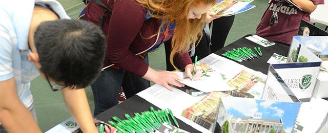 students signing up for Columbia State